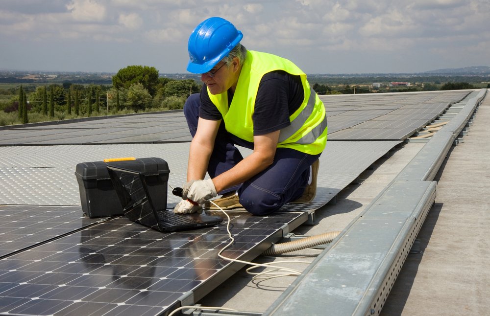 Engineer-testing-solar-panels.jpg