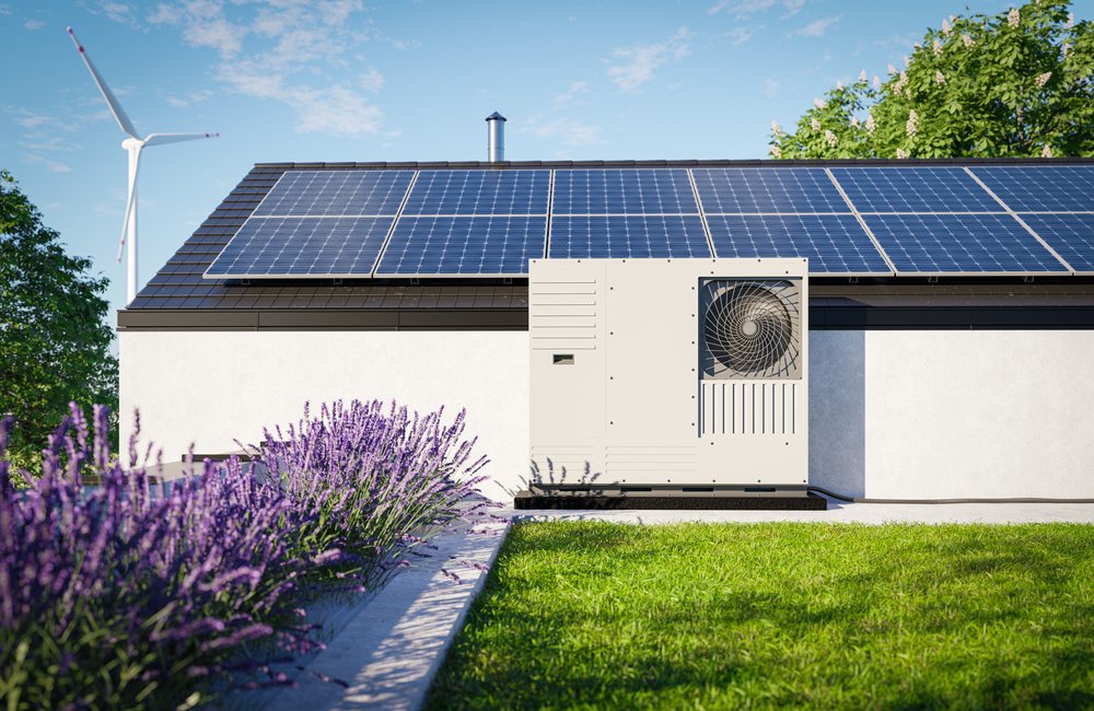 A-heat-pump-with-photovoltaic-panels-installed-on-the-roof-of-a-single-family-house-eco-friendly-heating-and-air-conditioning-solution-for-the-property.jpg