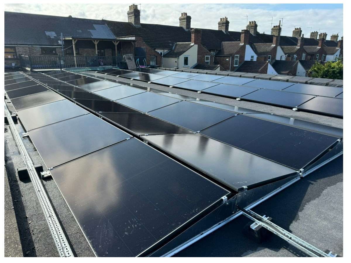 Commercial flat roof solar array installed in Thetford Norfolk with premium fixings